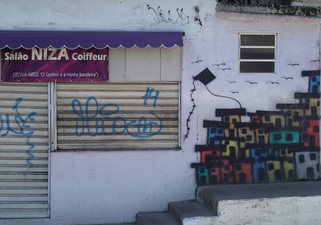 Favela stack design painted on an actual favela stack in Rocinha. So meta.